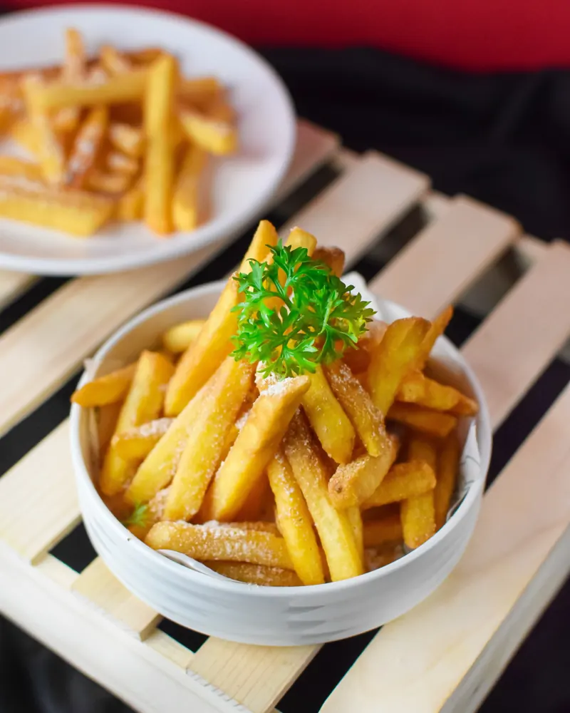 A bowl of seasoned fries